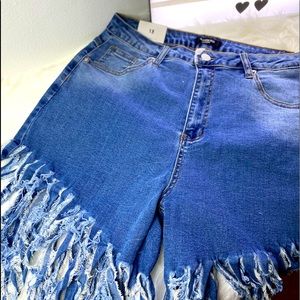 Plus Size Denim Fringe shorts.